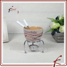 ceramic mini cheese fondue set with iron reck